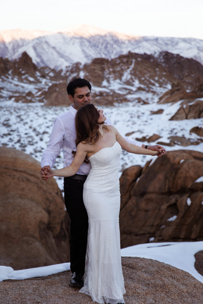 couple holding hands for there Alabama Hills elopement.