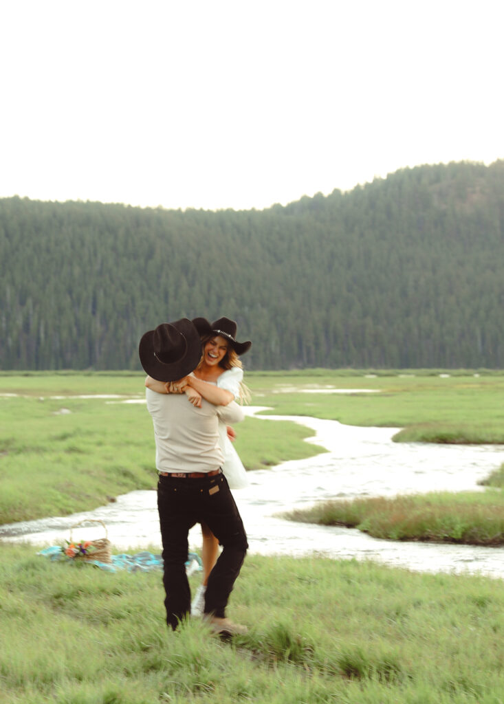 Girl be swung around in a field